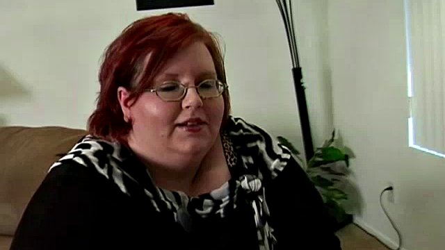 Fat redhead seduces a black man
