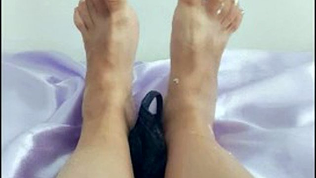 Foot fetish with black lace thongs covered in cosmetics