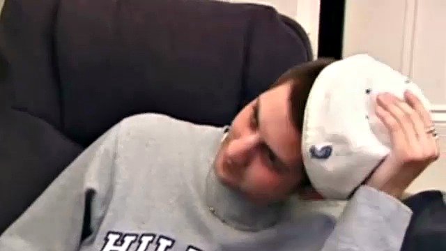 While playing a porn video, Aaron strokes himself hard and then pulls his dick out of his jeans. After a good long stroking show, this young man lets loose and spills his hot sticky cum all over the bed.