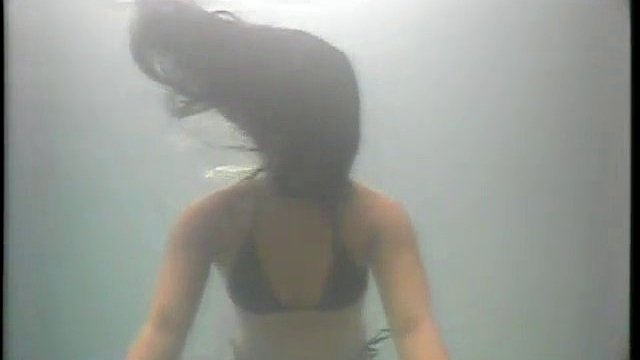 lesbians angel and christi in pool - more of them at grope-cam.com