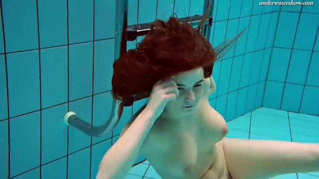 Fun Czech girl Vesta swims naked and horny.