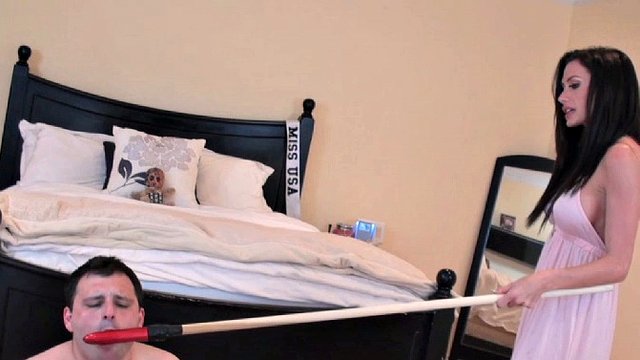 Glam bitch administers anal punishment