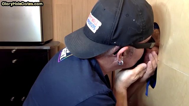 Mature DILF deepthroats and slurps on gloryhole dong