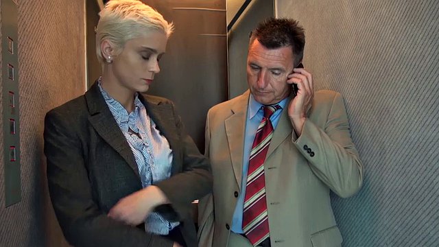 Busty office slut anally fucked in stuck elevator