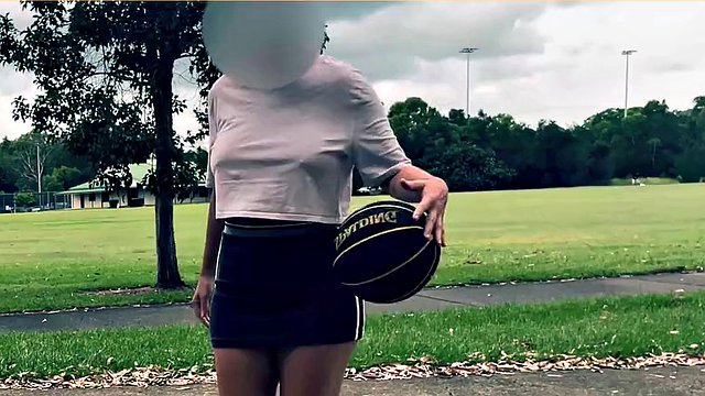 The wife dares to play basketball without bra and panties in a short skirt.