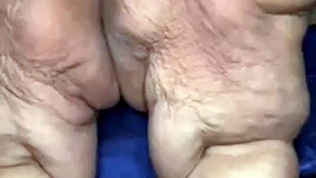 Horny grandma in a blue satin dress sexy