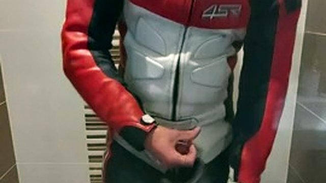 Leather biker fucks and fills combat boots with cum