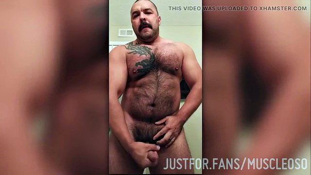 Hairy Latino muscle jerks off in gym bathroom with cumshot