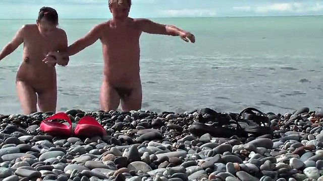 NUDIST BEACH – Naked young couple on the beach, naked teen couple
