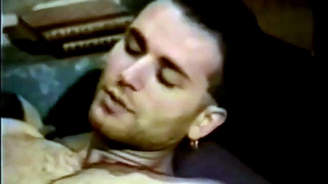 A horny guy gets a tranny's dick stuffed into his mouth and sucks it deep - Vintage video