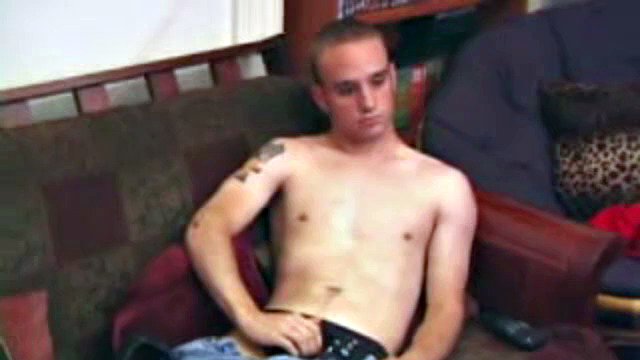 Ethan strips naked and strokes his cock while watching a porn video. After oiling up his ass, he finger fucks himself and then inserts a dildo. Ethan gives his ass a good workout before shooting him in the chest with a huge amount of cum.