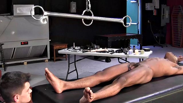 Molesting his BDSM gay sex slave with various sex toys