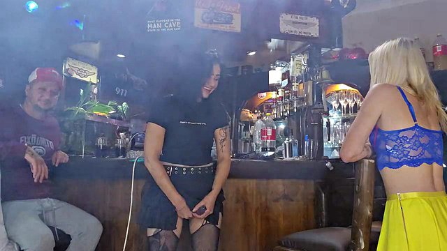 Girls fucking each other with strapless dildo while husbands watch