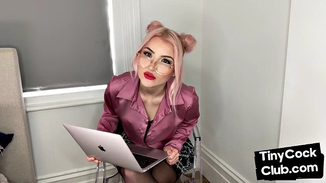 CFNM babe with glasses mocking pictures of tiny cock losers