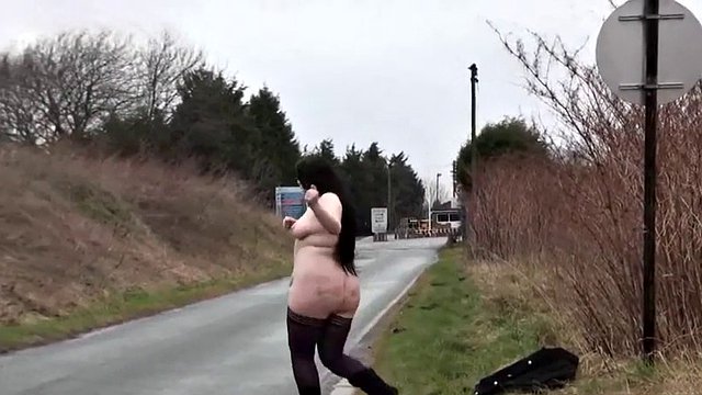 Ugly fat slut walking naked on a public road