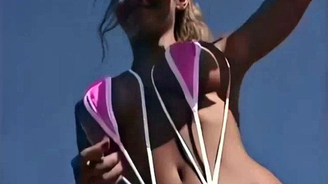 Jodi pink slingshot bikini (AI enhanced)