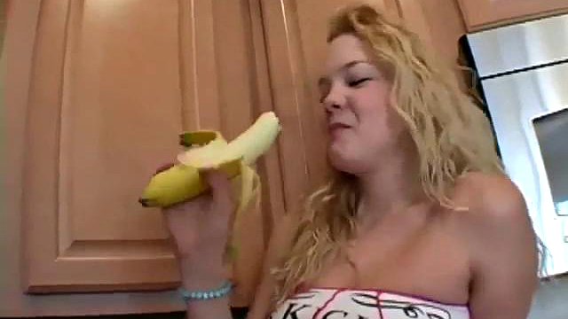 Naughty solo teen slut chewing on a banana