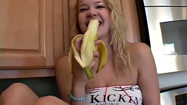 Naughty solo teen slut chewing on a banana