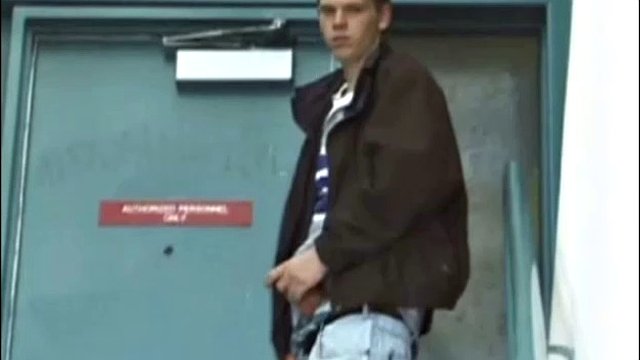 Christian enters the men's bathroom with holes. In one of the cabins, he grabs his cock and starts jerking off. The camera shows us some hot angles of this straight guy as he works himself to the limit.